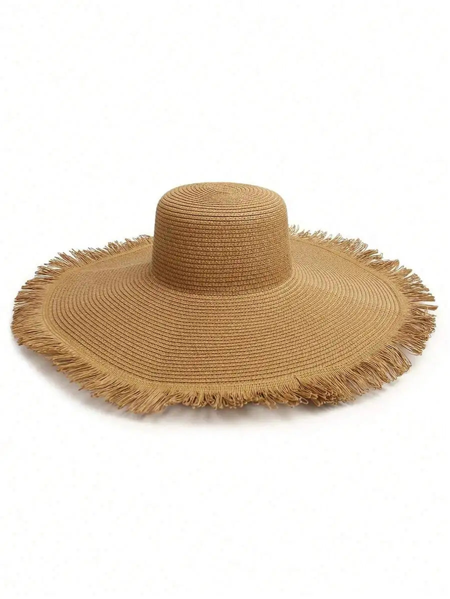 Oversized Woven Straw Sun Hat with Fringe Trim for Beach Travel and Resort Styling
