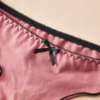 4-Piece Women’s Cotton Low-Rise Thong Panties Set with T-Back Silhouette, Decorative Bow Detail and Assorted Solid Colors
