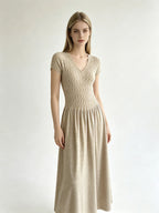 Elegant Short-Sleeve Smocked A-Line Midi Dress in Classic Black