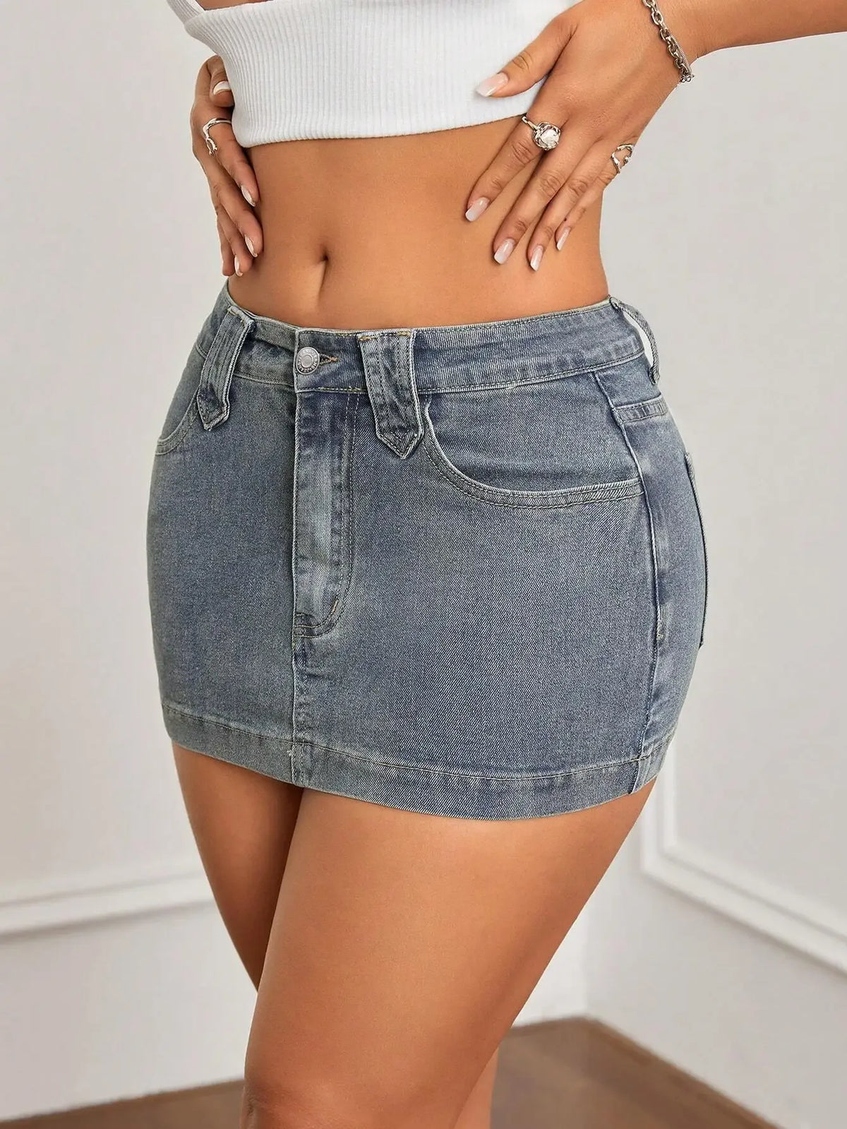 Washed Denim Bodycon Mini Skirt with Front Pockets and Slim Fit