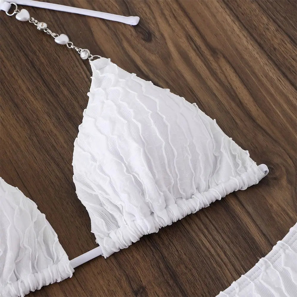 Crisp White Three-Piece String Bikini Set with Sheer Lace Long-Sleeve Cover-Up