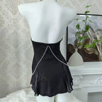 Daring Black Sheer Mini Dress with Open Bodice and Decorative Chain Details