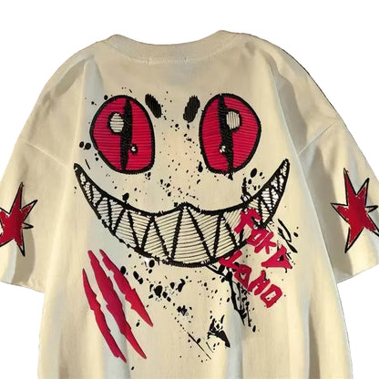 Oversized Graffiti Smile Graphic Cotton T-Shirt with Street Art Inspired Design