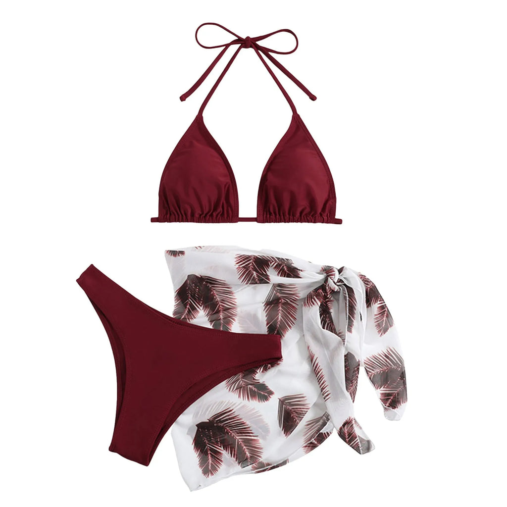 Emerald Green Three-Piece Bikini Set with Halter Triangle Top, Matching Bikini Bottom and Printed Beach Wrap
