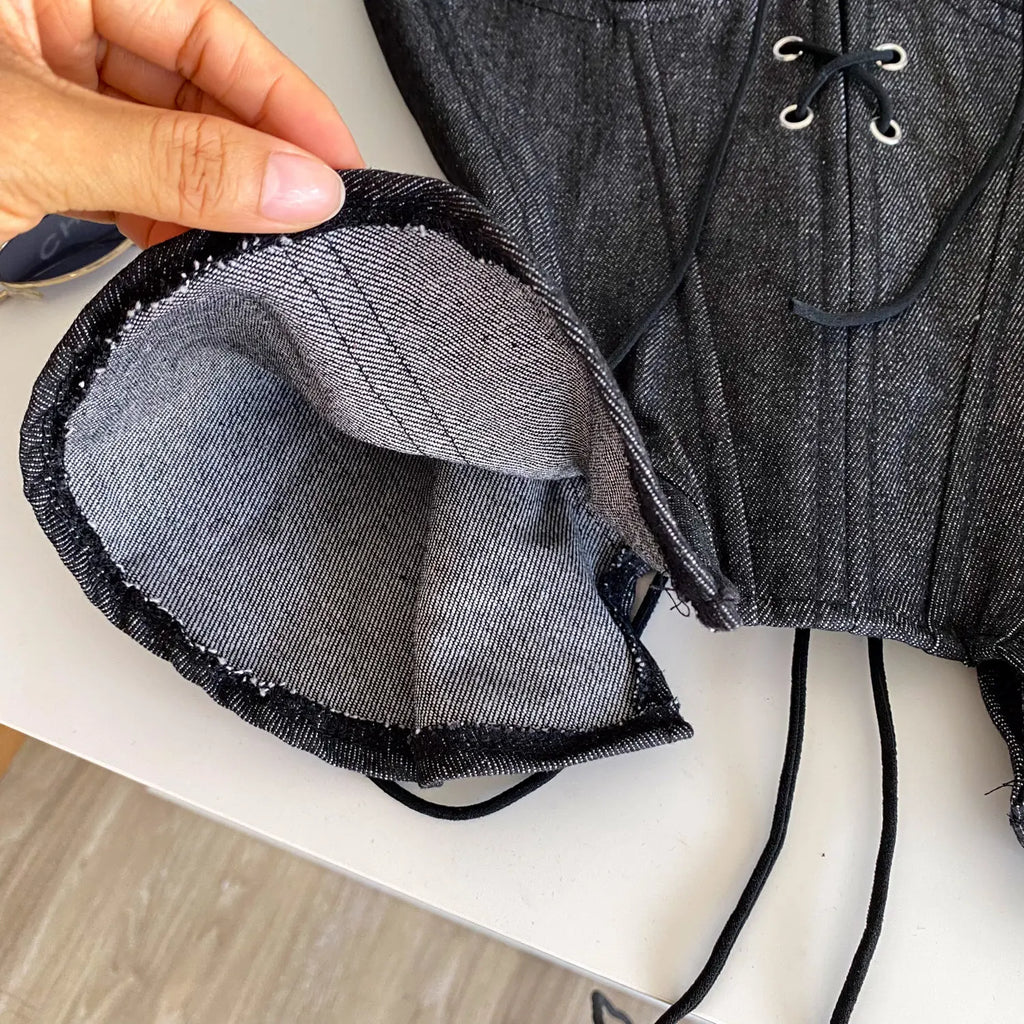 Dark Denim-Inspired Strapless Lace-Up Bustier with Asymmetrical Peplum Hem