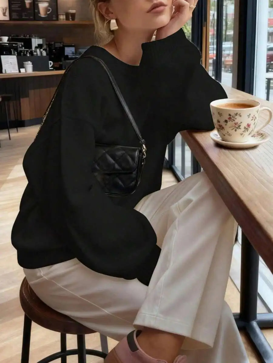 Women's Minimalist Crew Neck Knit Sweater with Relaxed Long Sleeve Silhouette