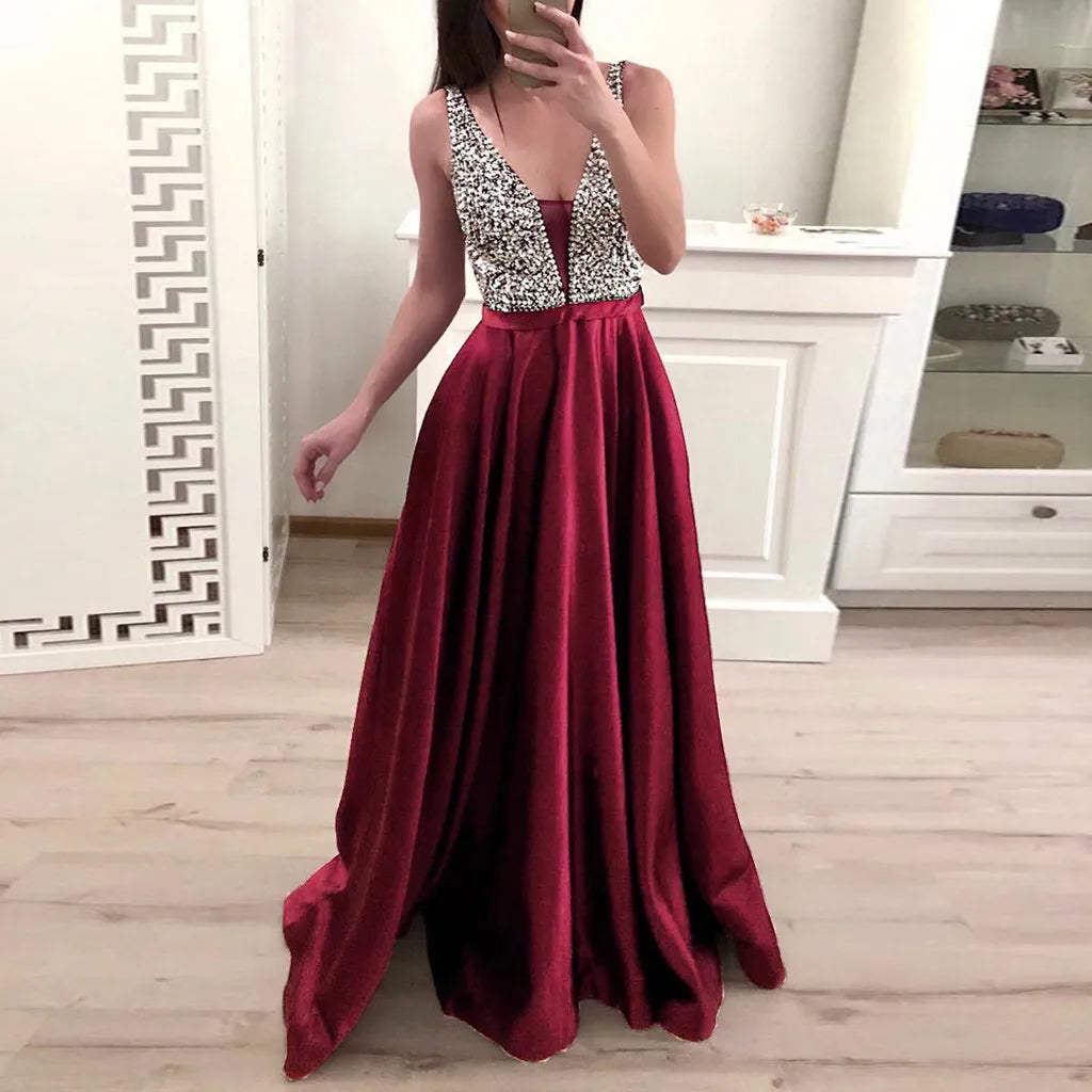 Deep V Maxi Dress With Textured Bodice And Flowing Skirt
