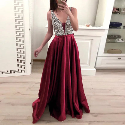 Deep V Maxi Dress With Textured Bodice And Flowing Skirt