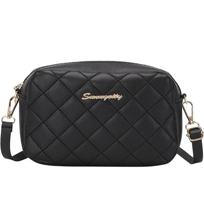 Quilted Chain Strap Saddle Crossbody Bag with Tassel Accent Design