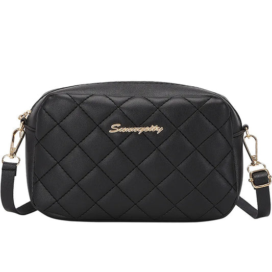 Quilted Chain Strap Saddle Crossbody Bag with Tassel Accent Design