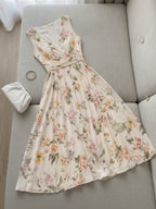 Romantic Pastel Floral Wrap-Style Midi Dress with Pleated A-Line Skirt