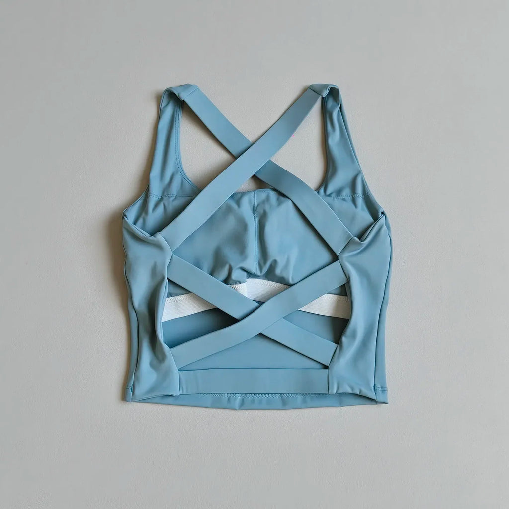 High-Coverage Sports Bra with Architectural Criss-Cross Strappy Back