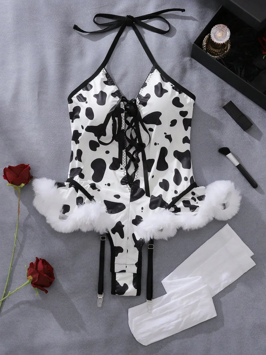 Playful Cow Print Plunge Bodysuit with Faux Fur Trim and Garter Straps