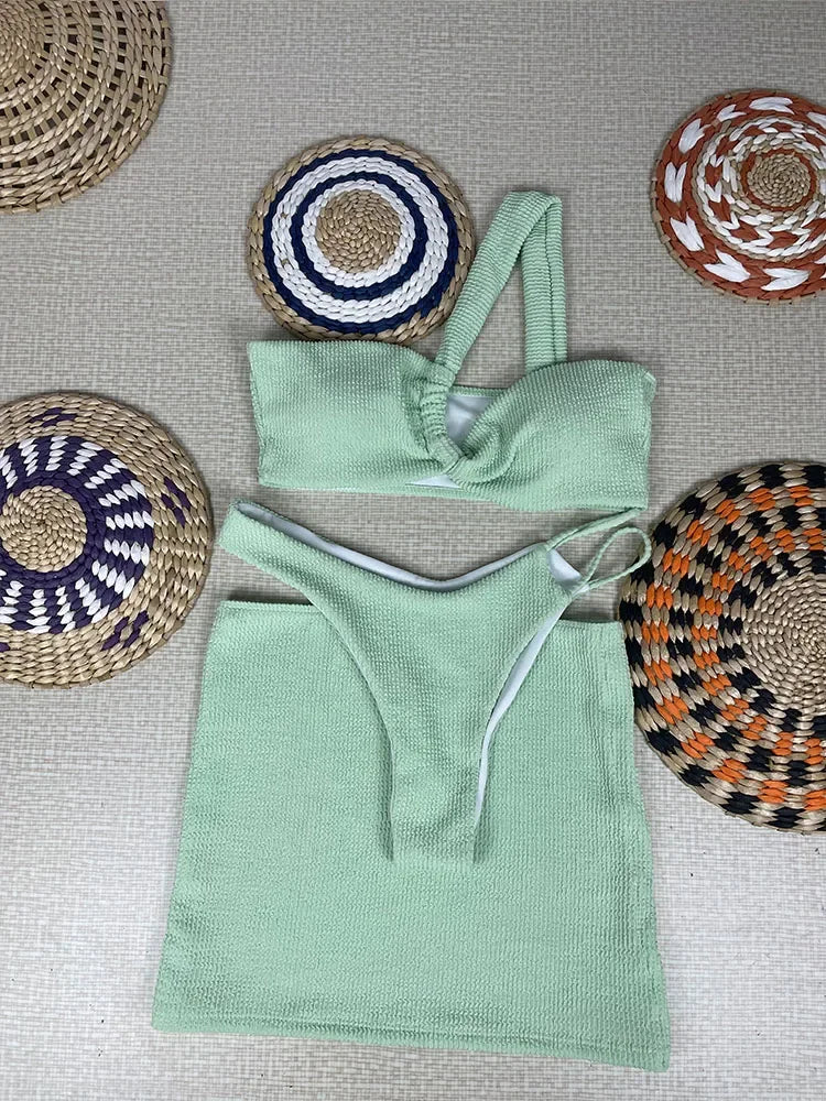 Vibrant Orange Three-Piece Swimwear Set with Ruched Bralette and Cover-Up Skirt