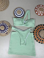 Vibrant Orange Three-Piece Swimwear Set with Ruched Bralette and Cover-Up Skirt