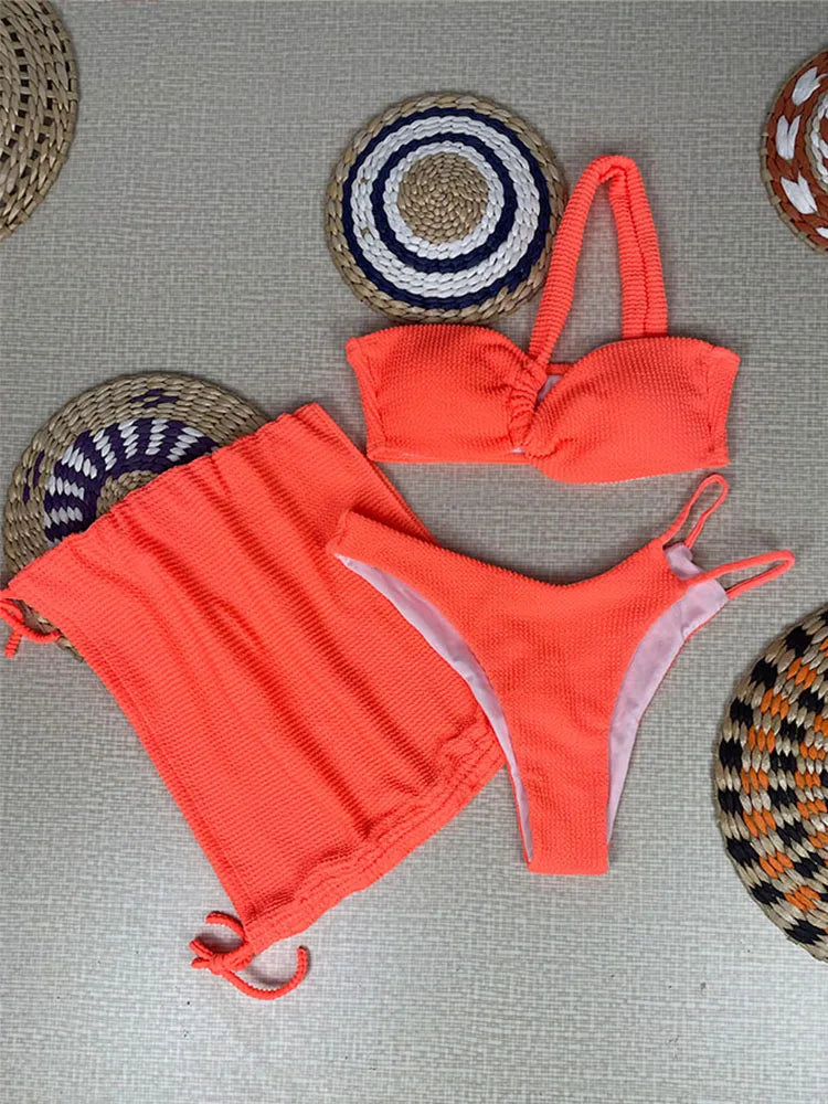 Solid Black Three-Piece Swimwear Set with Asymmetric One-Shoulder Top and Ruched Skirt