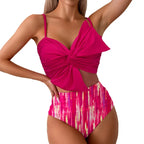Vibrant Orange Bowknot Bikini Top with High-Waisted Tropical Print Bottom