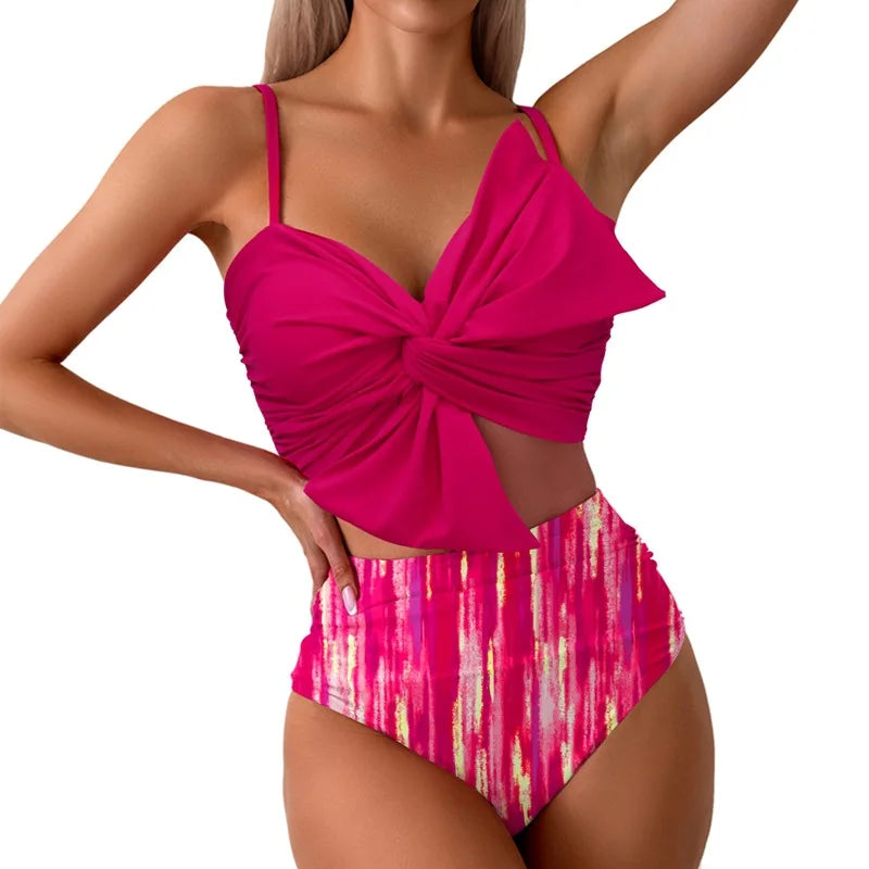 Vibrant Orange Bowknot Bikini Top with High-Waisted Tropical Print Bottom