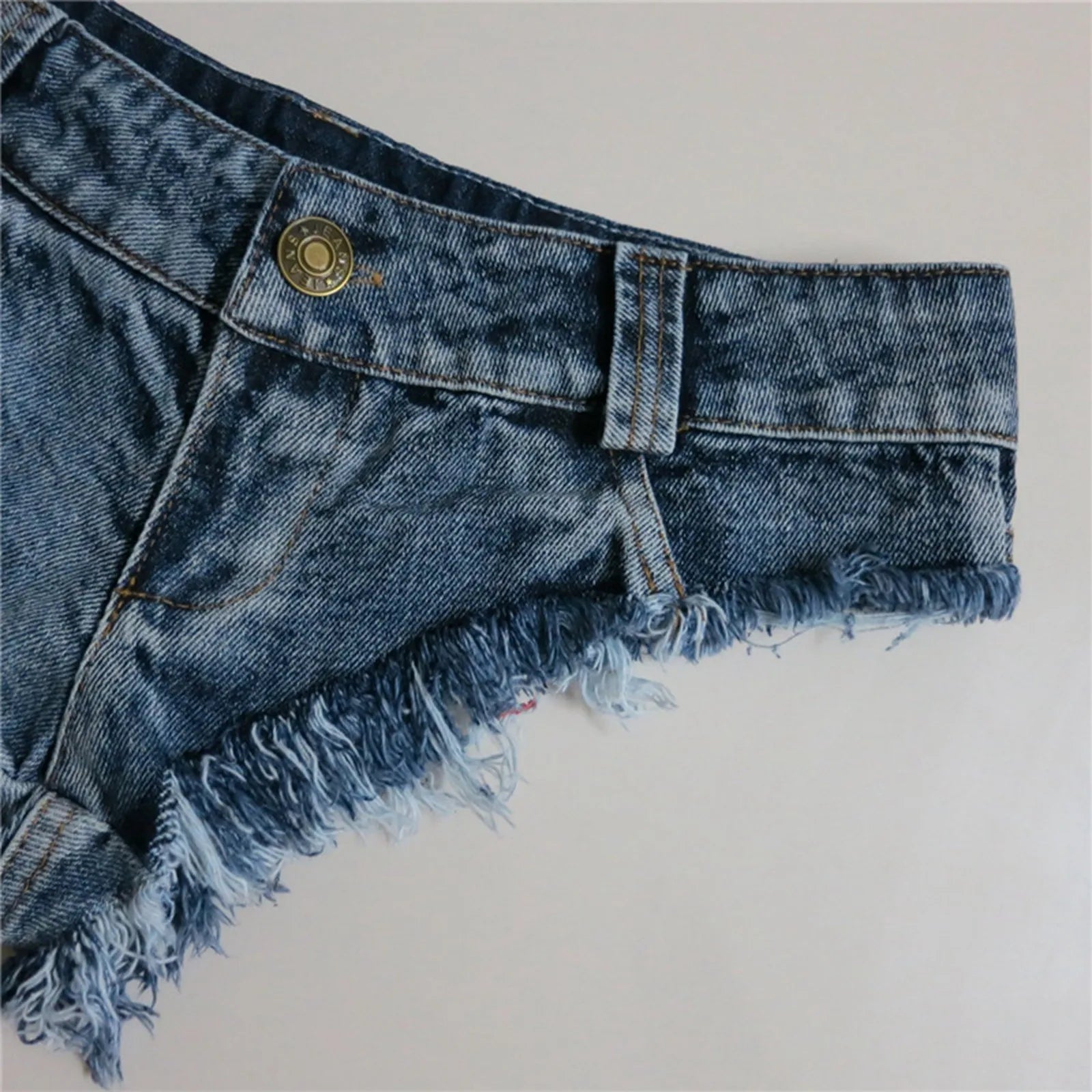 Women's Low Rise Raw Edge Denim Style Shorts with Slim Fit Beach Fashion Design