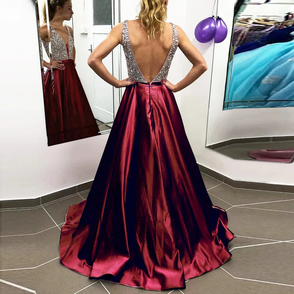 Deep V Maxi Dress With Textured Bodice And Flowing Skirt