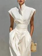 Crisp White High-Neck Architectural A-Line Dress with Pleated Waist and Pockets