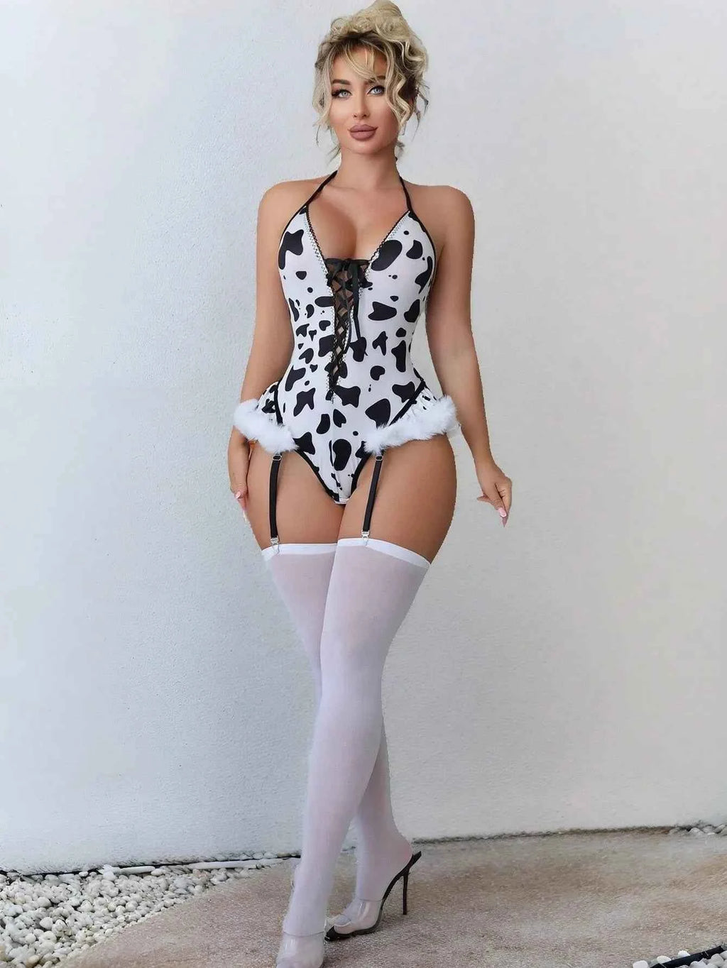 Playful Cow Print Plunge Bodysuit with Faux Fur Trim and Garter Straps