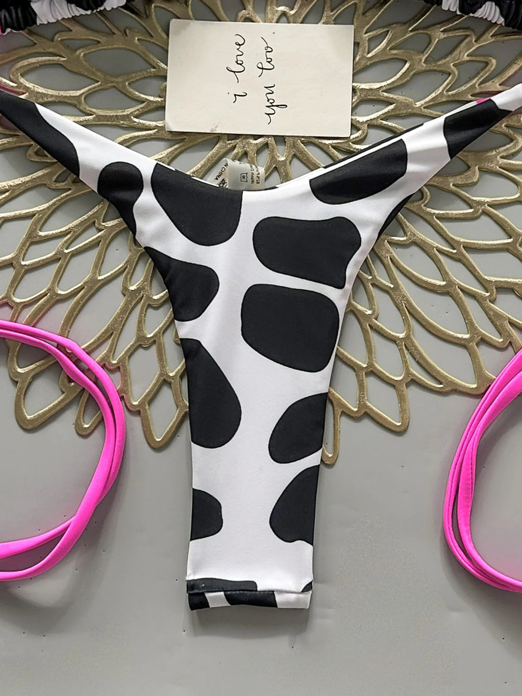 Bold Cow Print Triangle String Bikini with Neon Pink Binding