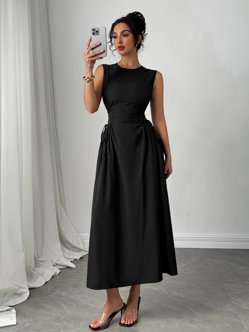 Minimalist Black Sleeveless A-Line Dress with Corset-Style Side Lacing Detail