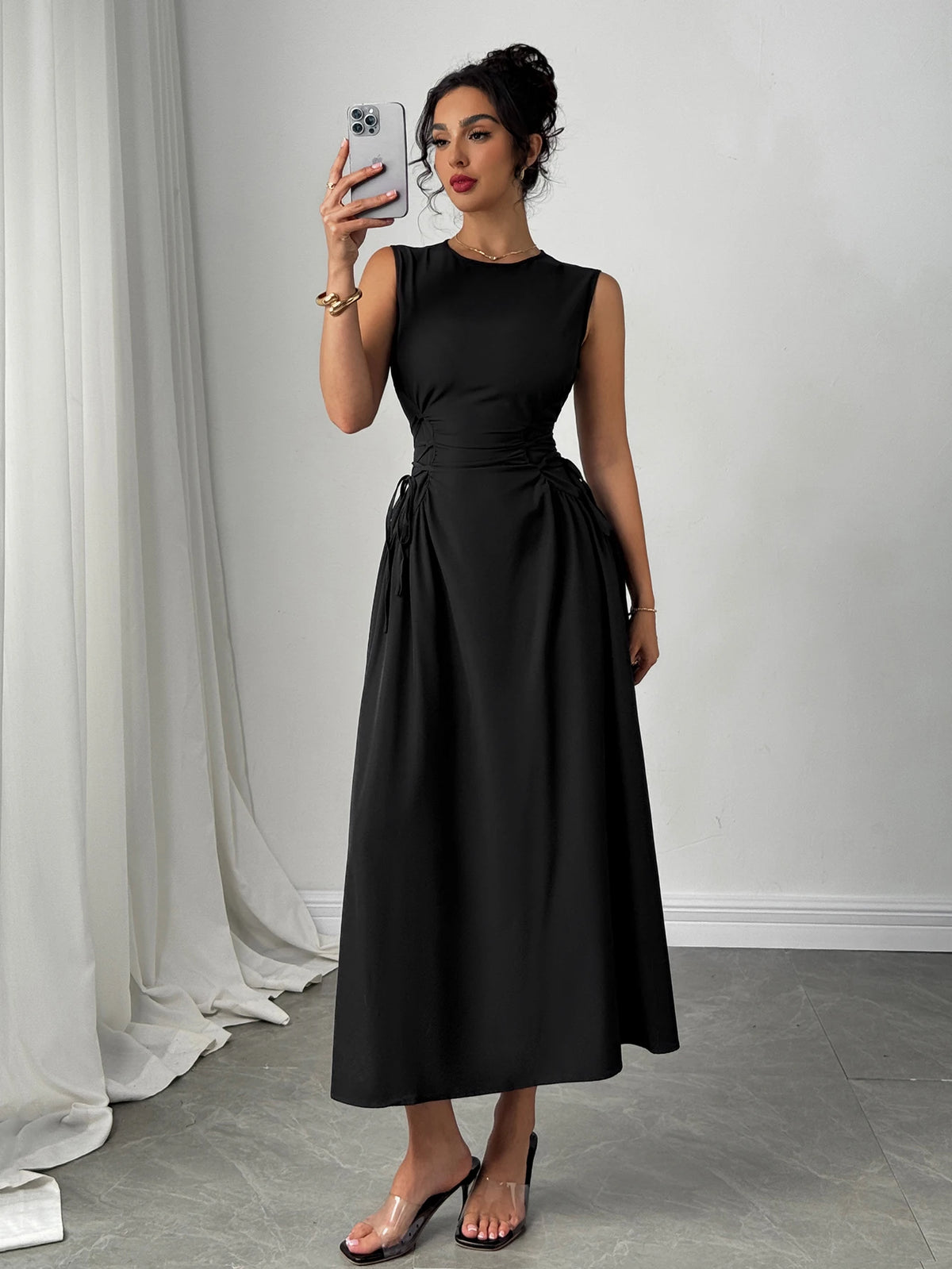 Minimalist Black Sleeveless A-Line Dress with Corset-Style Side Lacing Detail