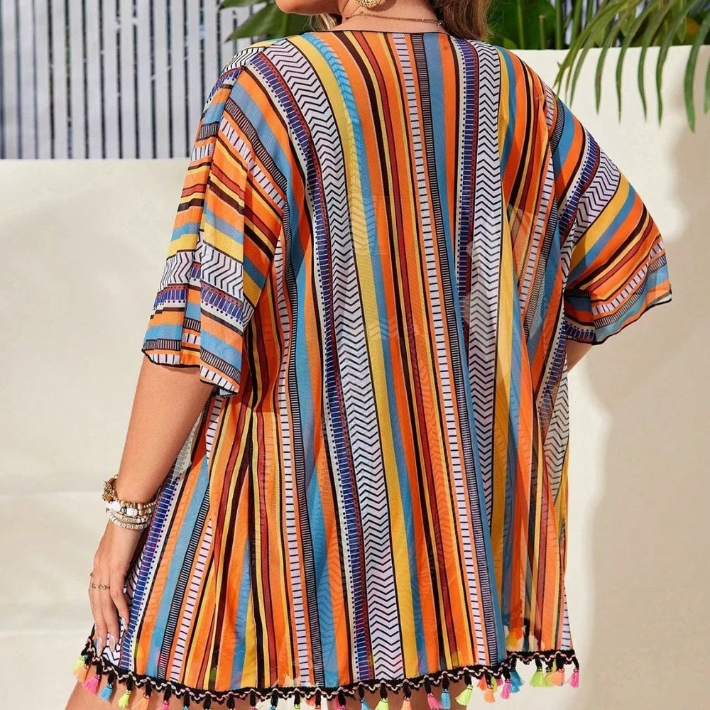 Vibrant Striped Four-Piece Swimwear Ensemble with Flowing Fringed Cover-Up