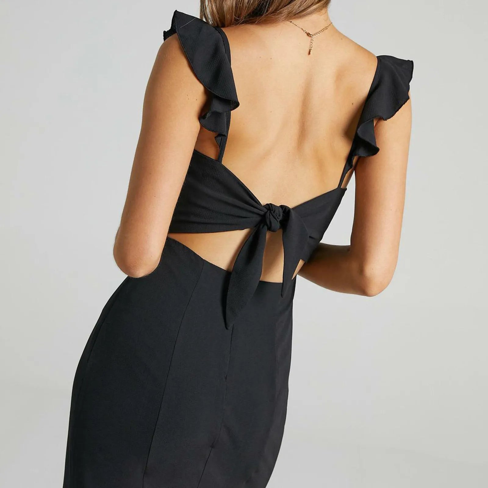 Ruched Sleeveless Maxi Dress With Deep Neckline And Front Slit