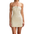 Strapless Polka Dot Mini Dress with Decorative Bow and Fitted Silhouette
