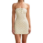 Strapless Polka Dot Mini Dress with Decorative Bow and Fitted Silhouette