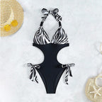 Black and Zebra-Print One-Piece Swimsuit with Cut-Out Waist, Tie-Side Details and Halter Neckline