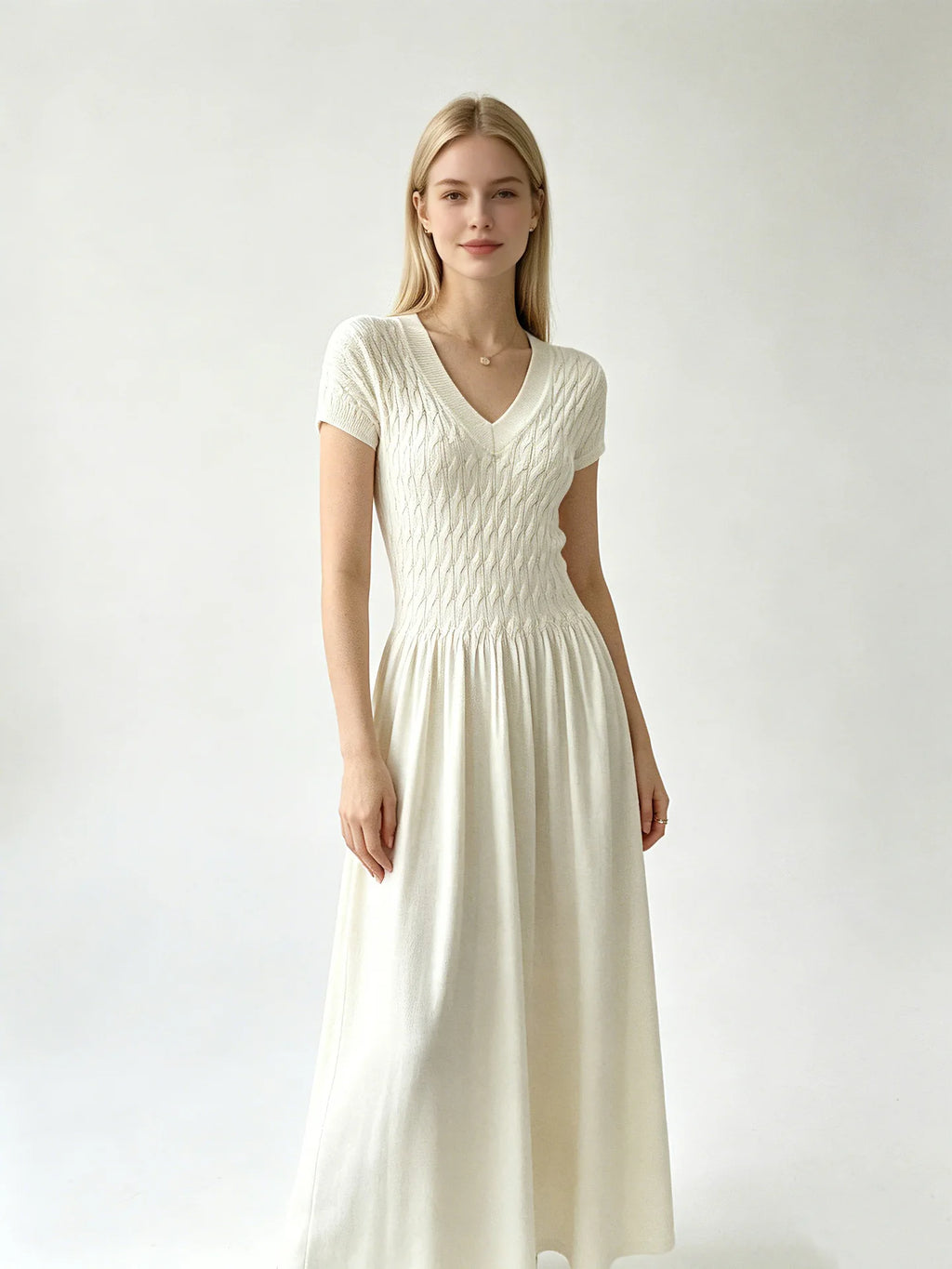 Elegant Short-Sleeve Smocked A-Line Midi Dress in Classic Black