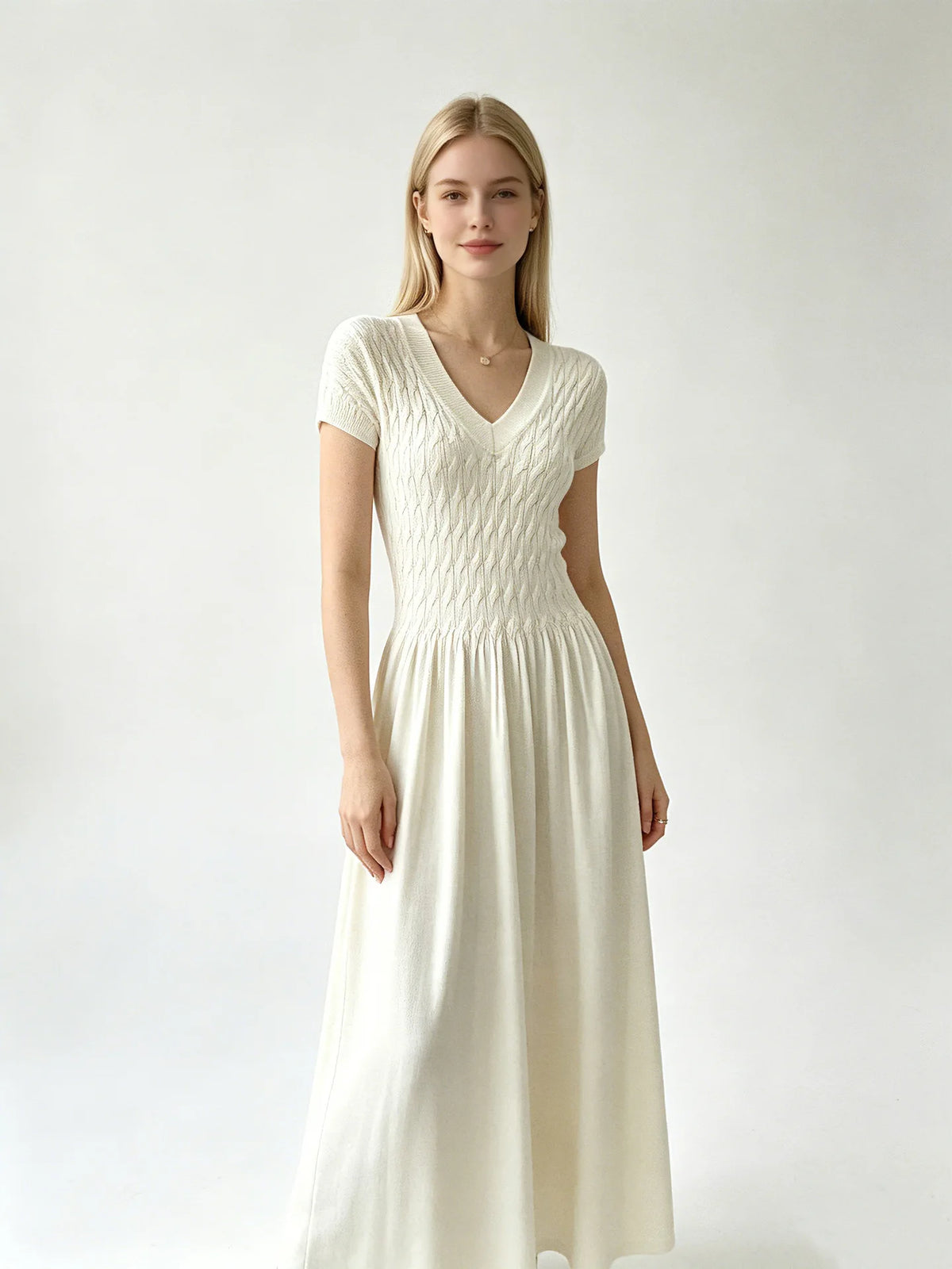 Elegant Short-Sleeve Smocked A-Line Midi Dress in Classic Black