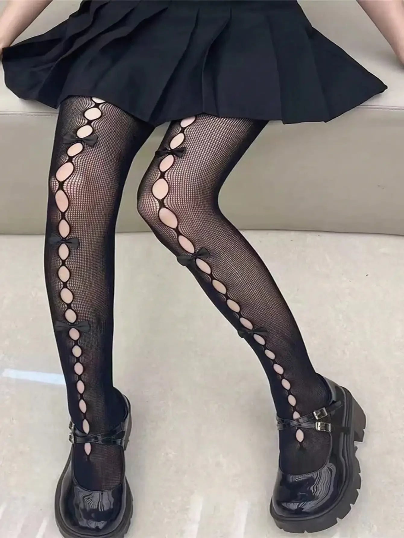 Decorative Bow Fishnet Thigh High Stockings with Open Mesh Pattern for Alternative Fashion Styling
