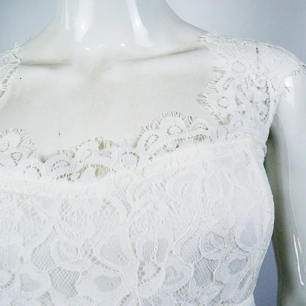 Open Back Floor Length Dress With Soft Structured Draping
