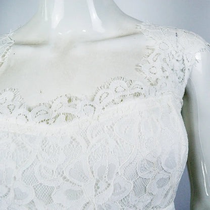 Open Back Floor Length Dress With Soft Structured Draping