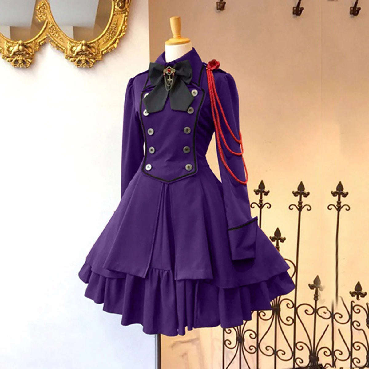 Medieval-Inspired Green and Black Flared Coat Dress with Decorative Bow and Brass-Tone Buttons
