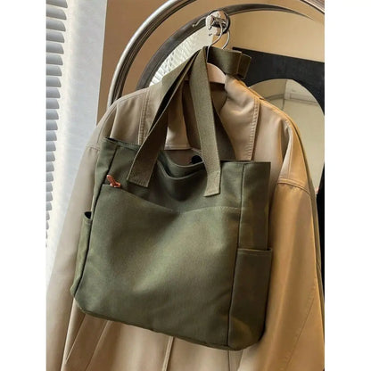 Multi Pocket Utility Hobo Tote Bag with Relaxed Carry Design
