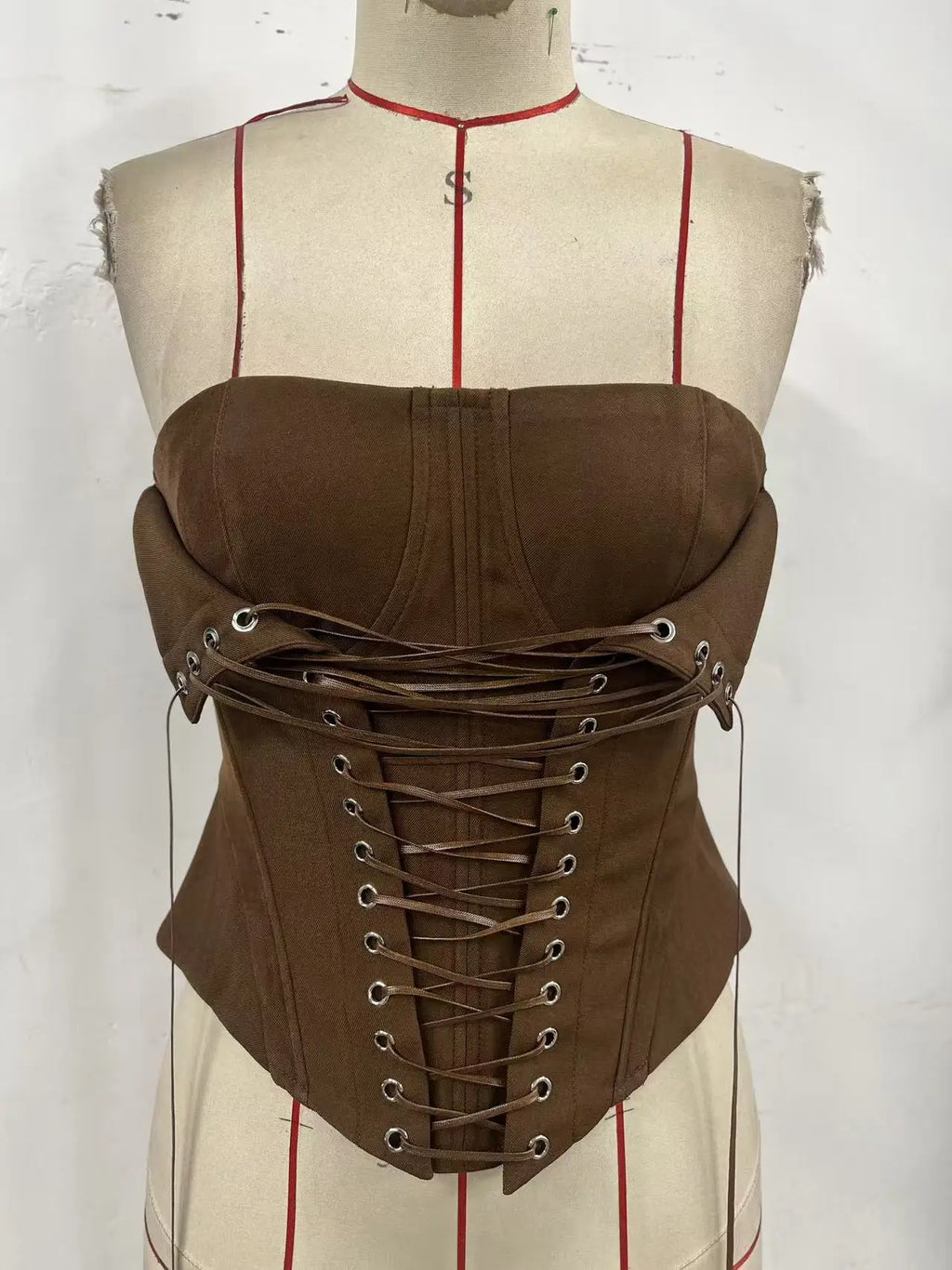 Earthy Brown Ribbed Strapless Corset Top with Dramatic Front Lace-Up Detailing