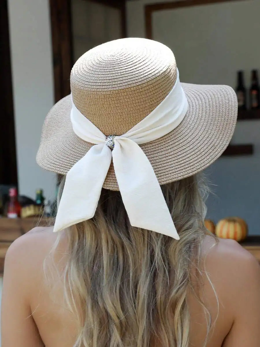 Wide Brim Straw Sun Hat with Decorative Bow and Foldable Beach Travel Design