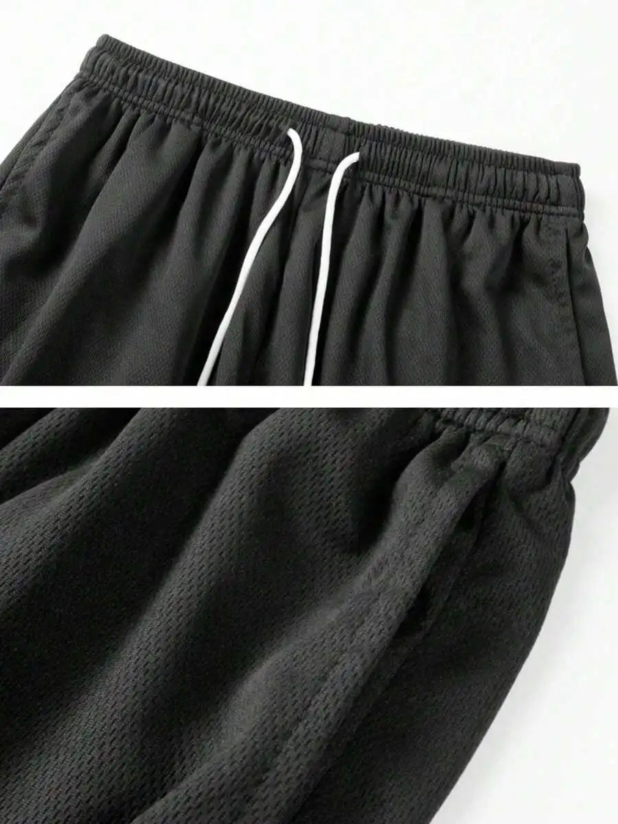 Men's Loose Fit Mesh Basketball Shorts with Elastic Waist and Athletic Everyday Comfort