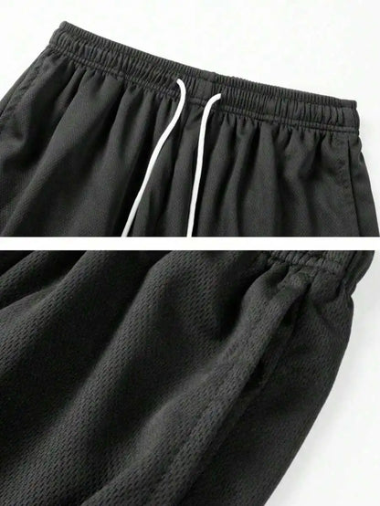 Men's Loose Fit Mesh Basketball Shorts with Elastic Waist and Athletic Everyday Comfort