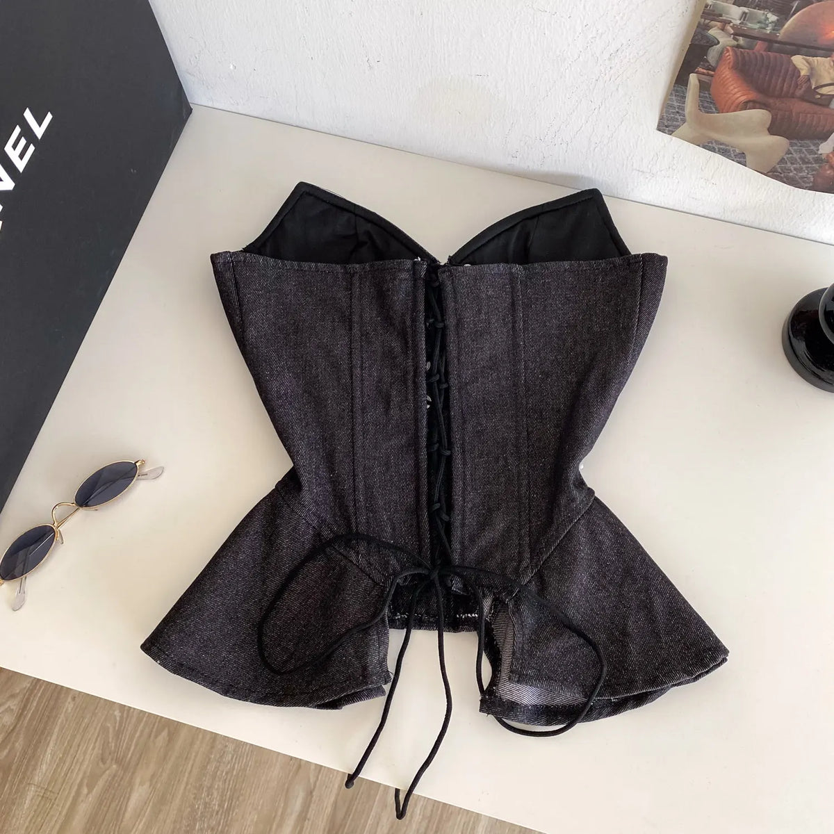 Dark Denim-Inspired Strapless Lace-Up Bustier with Asymmetrical Peplum Hem