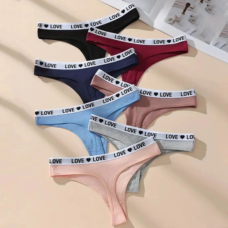 7-Piece Women’s Cotton Low-Rise Thong Panties Set with Striped Side Details, Minimal T-Back Silhouette and Assorted Black Designs