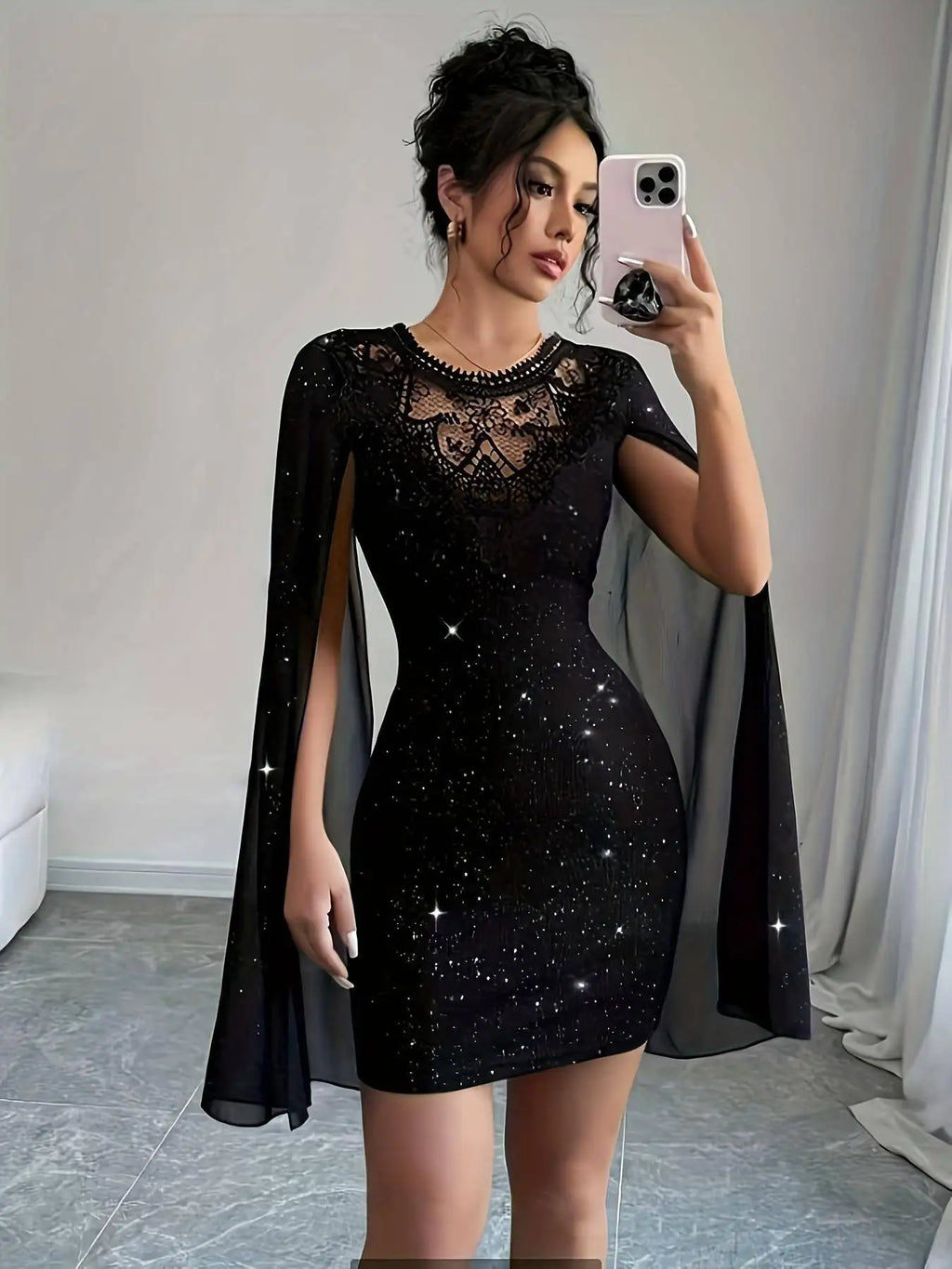 Glamorous Black Glitter Mini Dress with Sheer Lace Yoke and Flowing Cape Sleeves