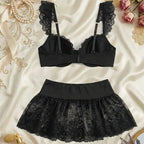 Playful Ruffled Black Lace Bralette and Mini Skirt Set with Contrast White Bows