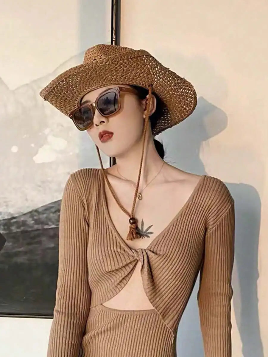 Hollow Woven Straw Cowboy Hat with Wide Brim for Beach Travel and Outdoor Adventures